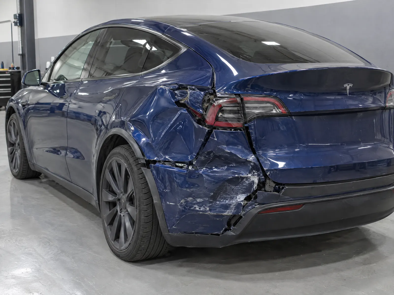 Before repair: Electric SUV · rear quarter panel