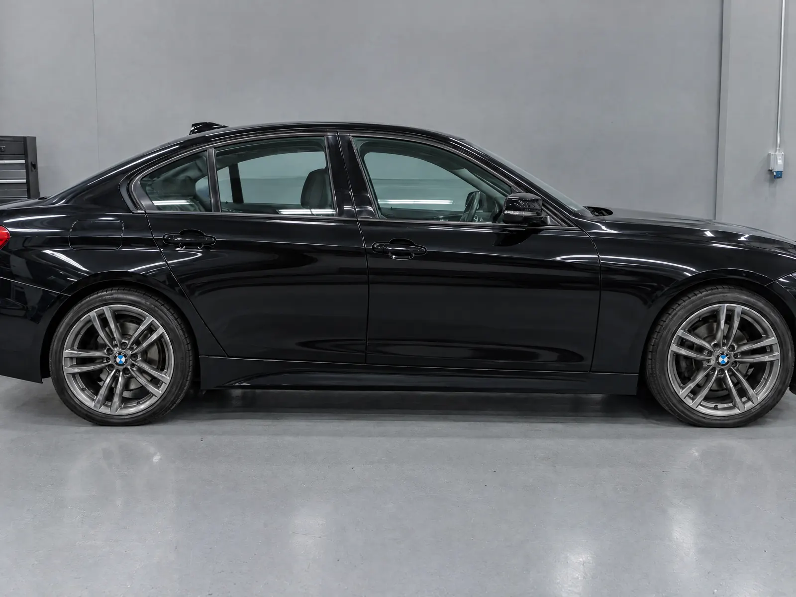 After repair: Luxury sedan · key scratch and door dents